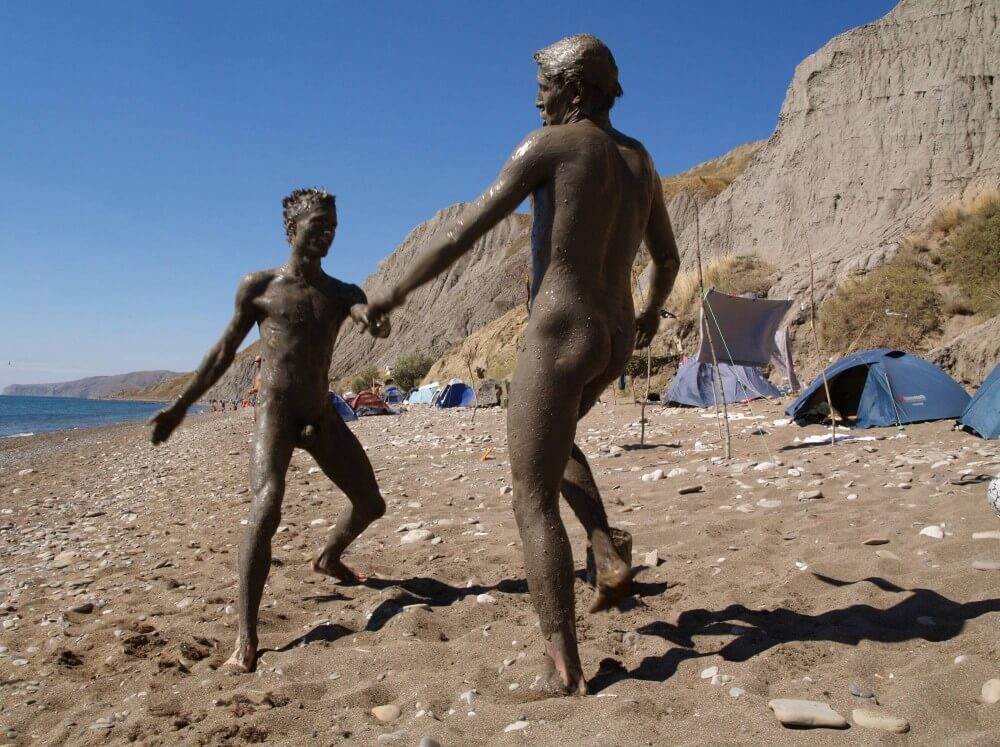 Jr Nudist Nude Beach Mud Soldiers photos - Melting under the scorching sun, I sunbathe naked