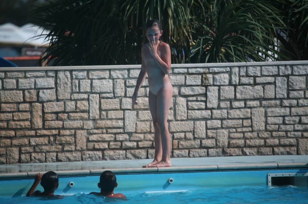 Naturist Pool-Side Singles photos - Nudity is seen as a natural part of life among nudists