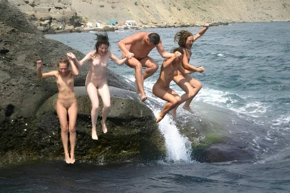 Mens and girls nudists on a beach - In nudist culture, sincerity, honesty, and respect for oneself and others are valued