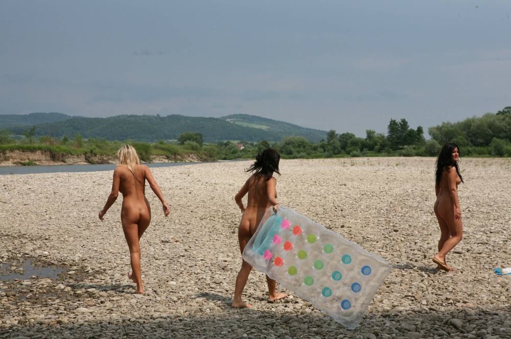 Naturist Park Floating On River photos - Nudity is perceived as a natural aspect of life