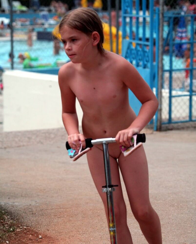 Pool-Side Naturist Scooter pics - Peace and tranquility as goals of the naturist life