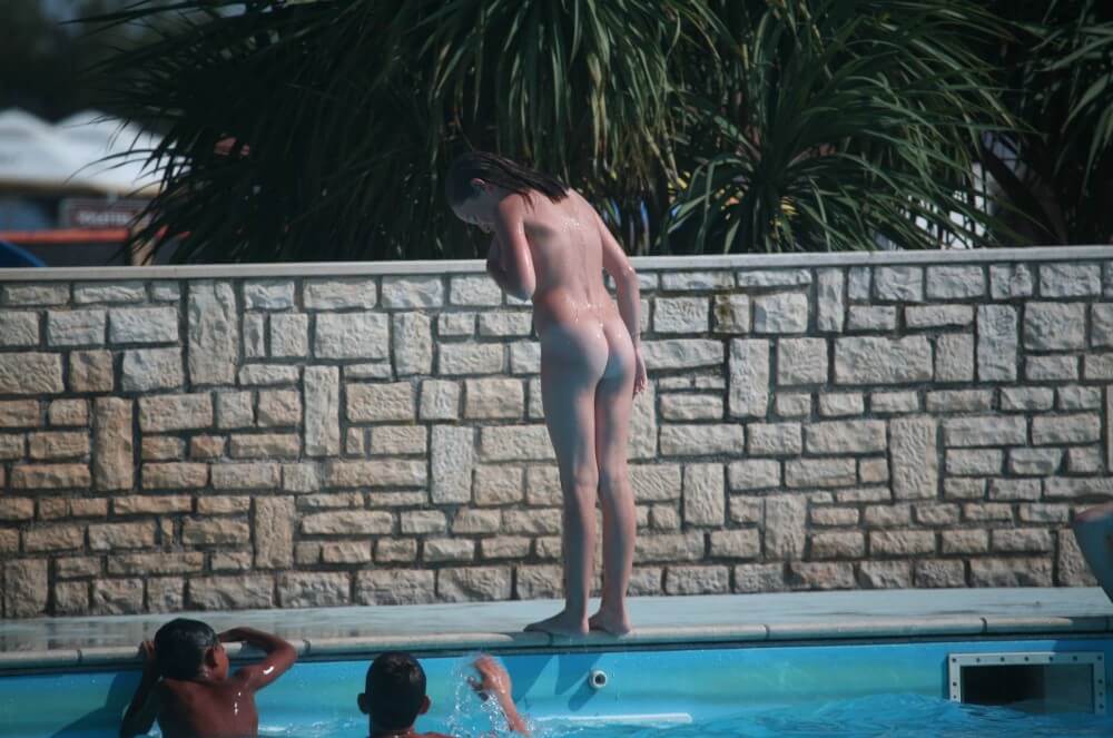 Naturist Pool-Side Singles pics - Wearing less clothing is fashionable