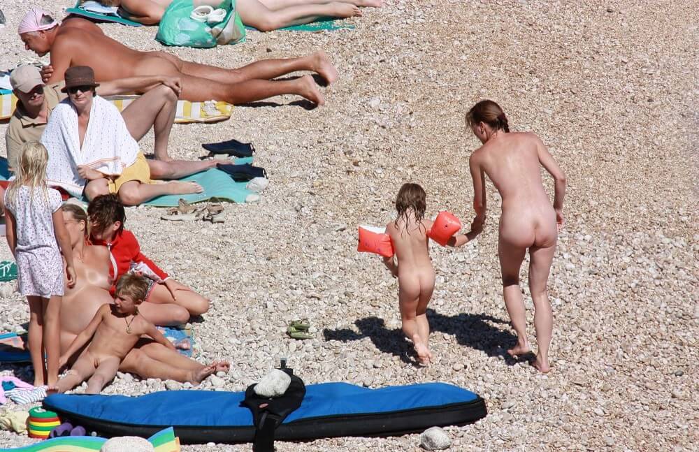 Orange Floaty Safety First Naturist pics - Nudism helps us accept ourselves and others