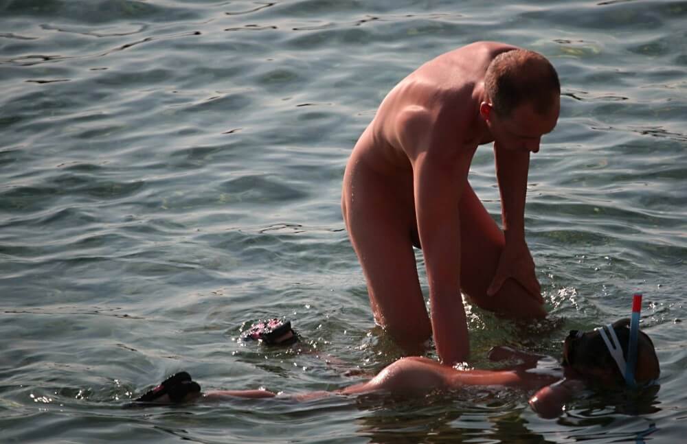 Father Floats His Daughter pics - Nudity in nudism is a form of honesty with oneself