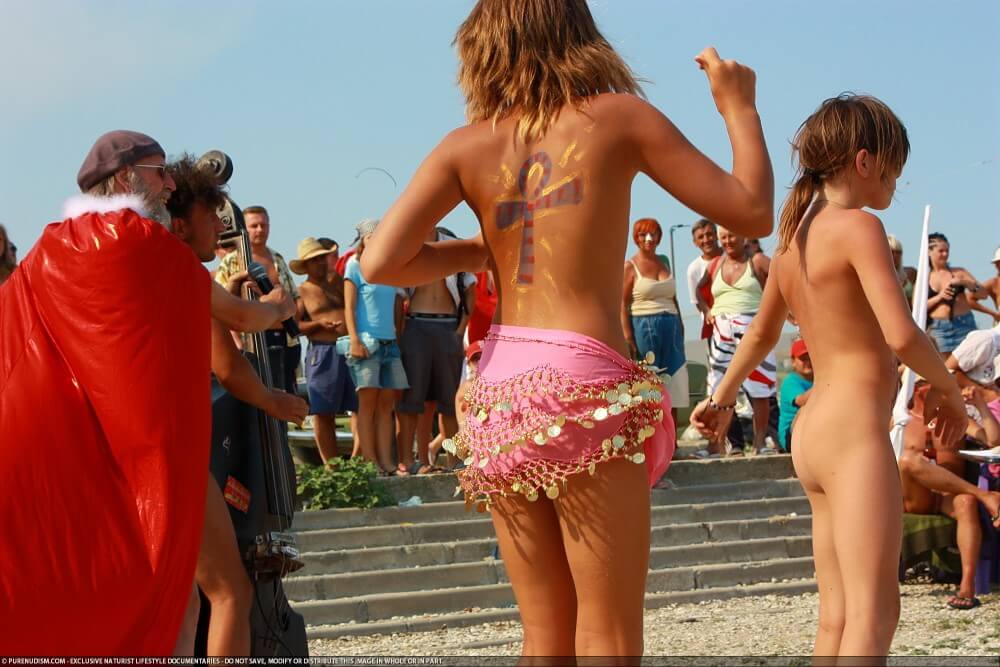 Colorful Carnival Dancing photos - A life free of unnecessary worries is a hallmark of naturism